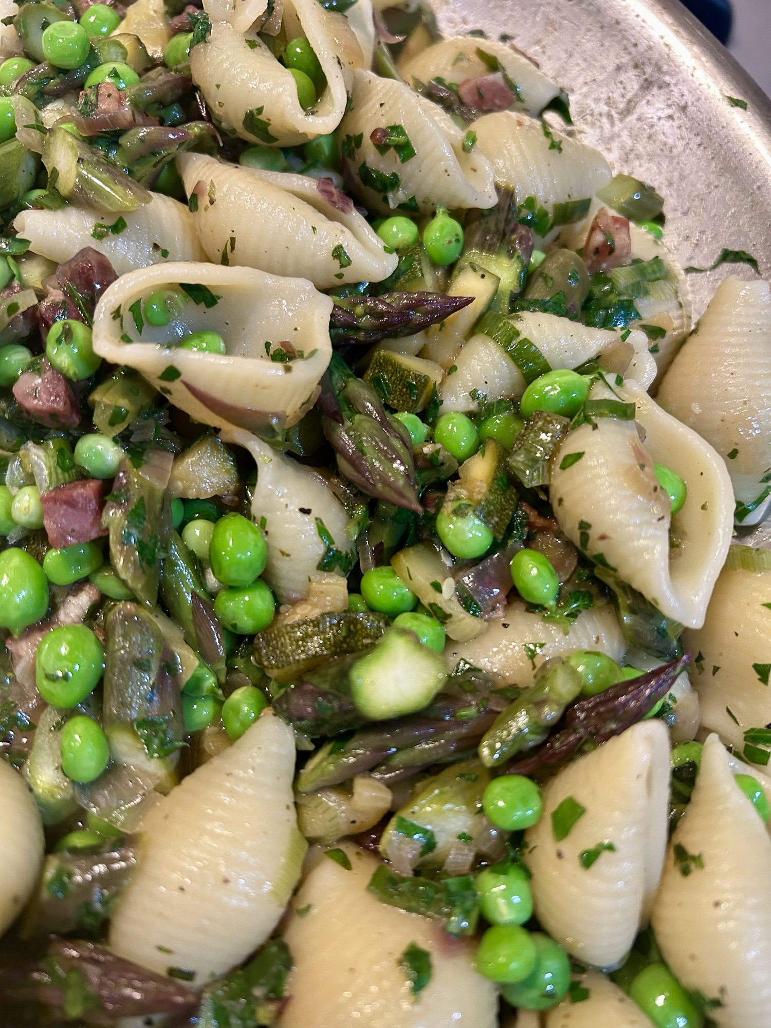 Pasta Primavera. A quick spring dish made with bacon, asparagus, sweet peas, and fresh herbs. Learn how to make fast meals that will satisfy and nourish your body.